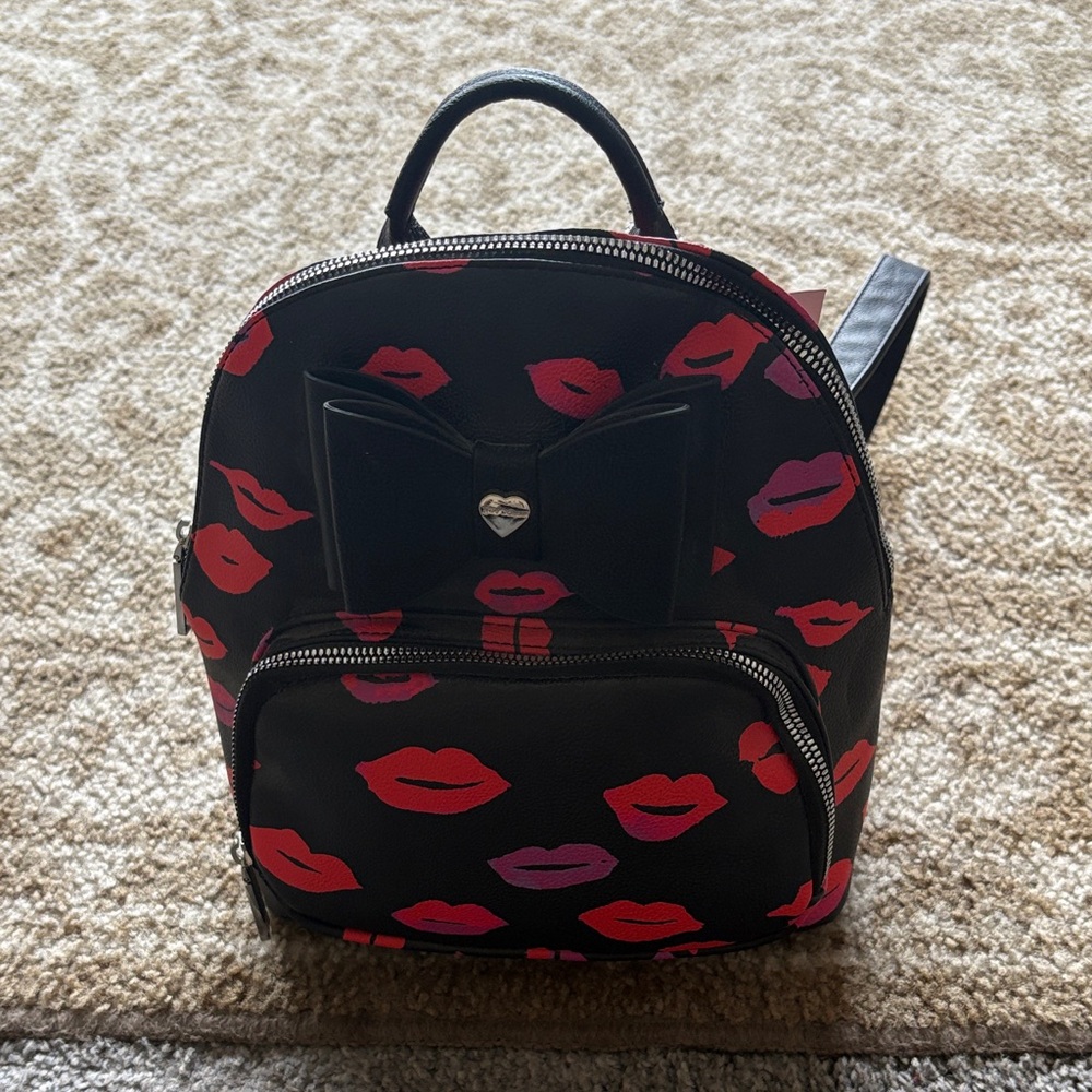 Betsey Johnson Black Backpack with Lip Print.